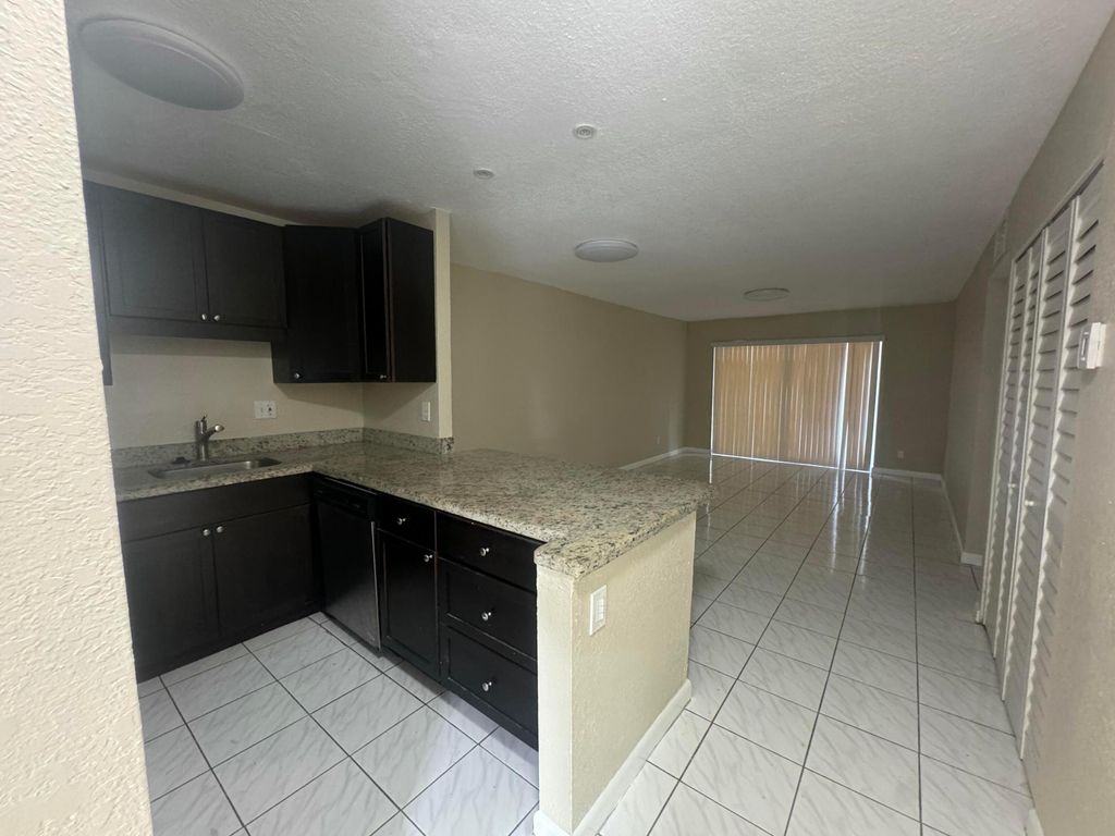 Photo of 837 NE 18th Court #Apt 7, Fort Lauderdale, FL 33305 (MLS # B26018376)