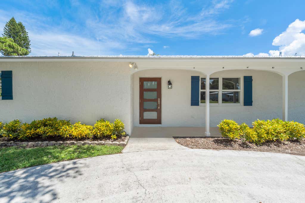 Photo of 871 SW 37TH Terrace, Palm City, FL 34990 (MLS # B26063898)