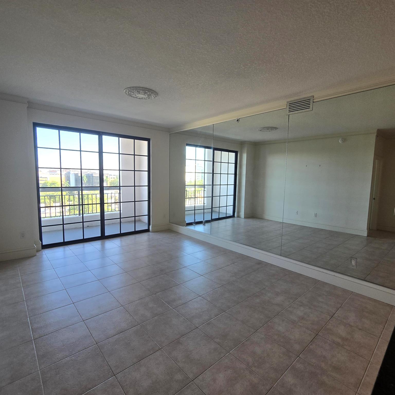 STUNNING TWO BEDROOM CONDO IN THE LUXURIOUS BOCA GRAND IN THE HEART OF DOWNTOWN BOCA RATON. THE UNIT IS VERY LIGHT & BRIGHT AND HAS TILE FLOORING THROUGHOUT. THE BEDROOMS ARE SPACIOUS WITH CUSTOM CLOSETS. THE KITCHEN HAS GRANITE COUNTERTOPS, STAINLESS STEEL APPLIANCES, AND ITALIAN WOOD CABINETRY. THE ENTIRE UNIT WAS FRESHLY PAINTED.