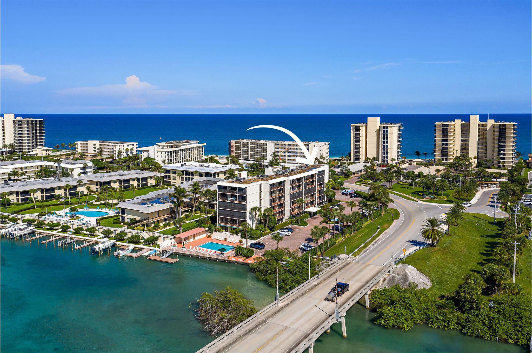 AVAILABLE SEPT & OCTOBER! Jupiter Island Building Across the street from the beautiful blue waters with peeks from the balcony of the Ocean and baby steps to the beach on the deeded access. This is such a sweet condo to rest your brain and body....Come enjoy this VERY Special Slice of Paradise pricing...