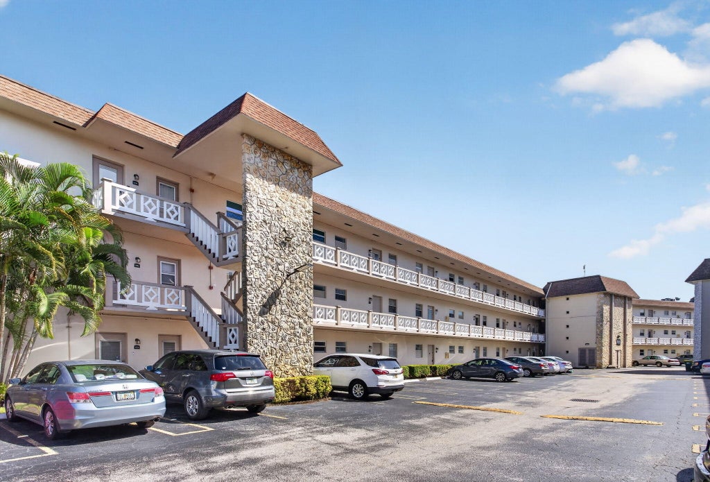 Photo of 5181 W OAKLAND PARK Boulevard #104, Lauderdale Lakes, FL 33313 (MLS # B26076805)