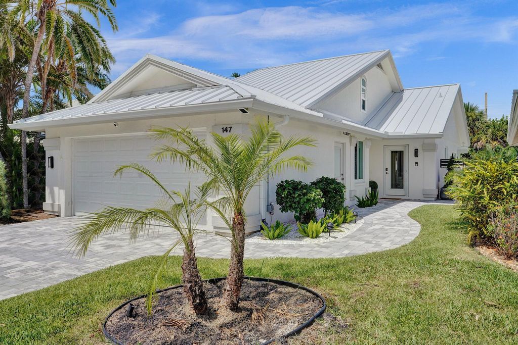 Photo of 147 Sand Pine Drive, Jupiter, FL 33477 (MLS # R11107288)