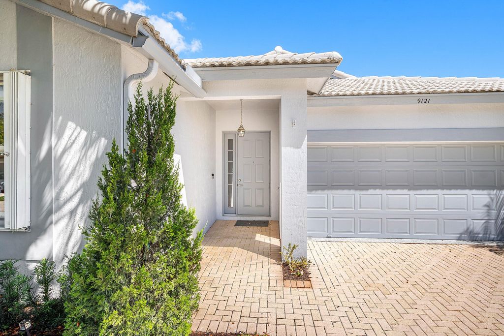 Photo of 9121 Bay Point Circle, West Palm Beach, FL 33411 (MLS # B26022602)