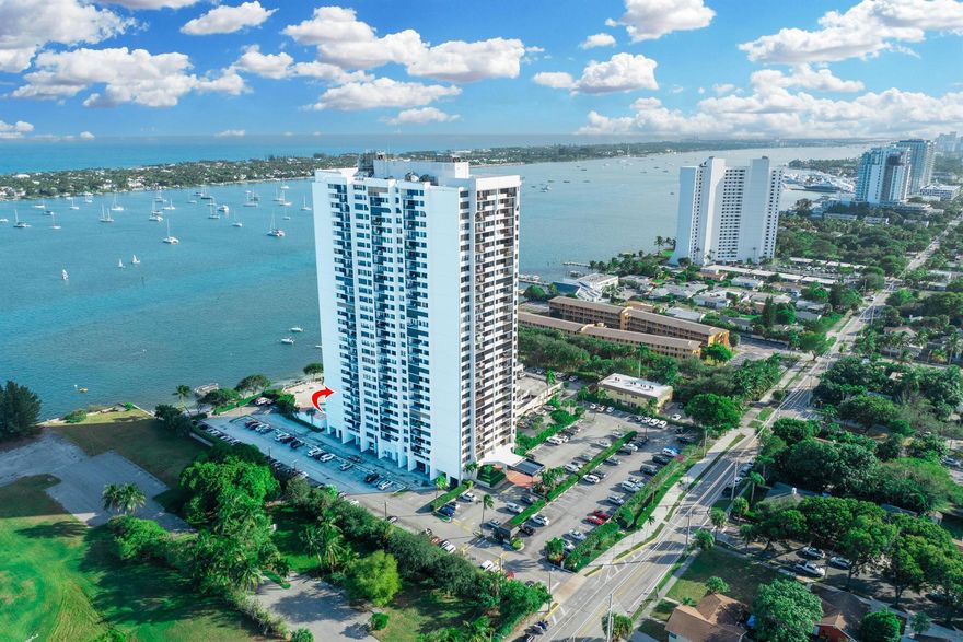 Enjoy gorgeous intracoastal views from this bright and airy 3 bedroom, 2 bathroom unit that comes with VERY RARE TWO MOORING BALL BOAT PARKING near the building's private fishing dock! When not used, you can easily rent those spots to other residents in the building. The living area and hallway are finished with shiplap. The split floor plan offers a lot of privacy. The primary bedroom offers access to the covered balcony and has a walk-in closet. The guest bathroom has a shower, quartz vanity and a stone encased wall. HOA includes exterior building insurance, internet, basic cable, water, sewer, trash, pest control and common area maintenance. Palm Beach House offers amazing amenities including its own private beach on intracoastal, three BBQ grills, lap pool, party rooms, library,