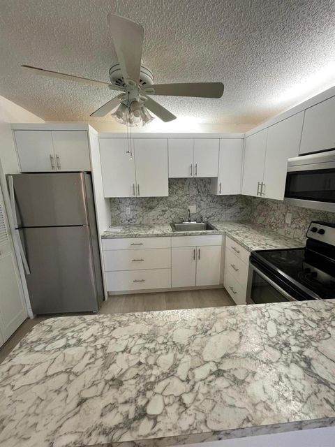 Condominium in Greenacres FL 423 Pine Glen Lane Ln.jpg