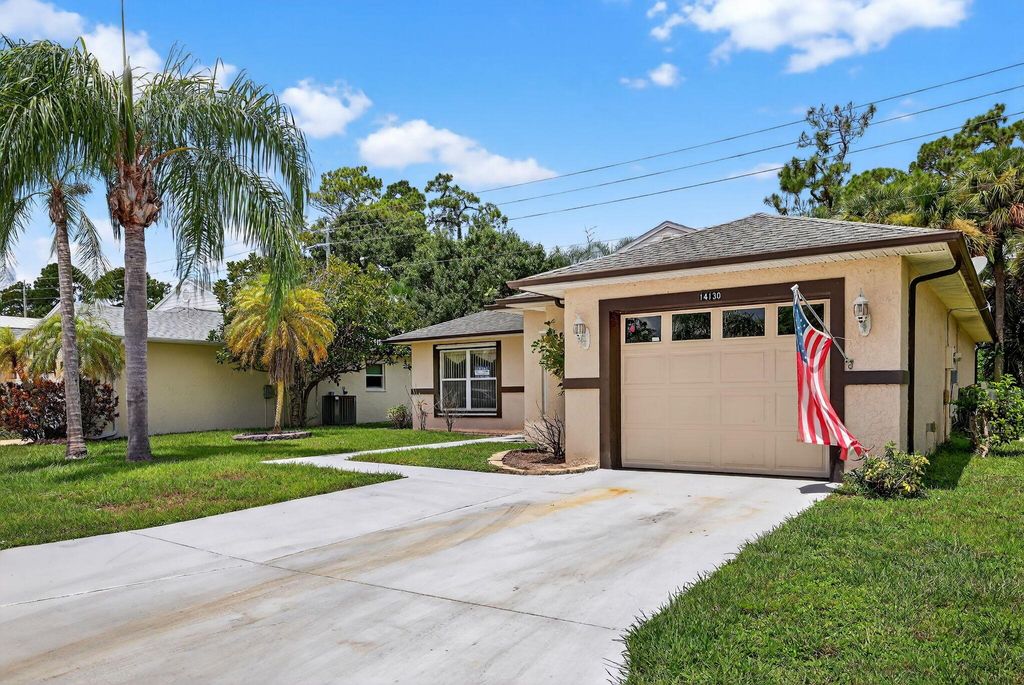 Photo of 14130 Aguila Ave, Fort Pierce, FL 34951 (MLS # R11111973)