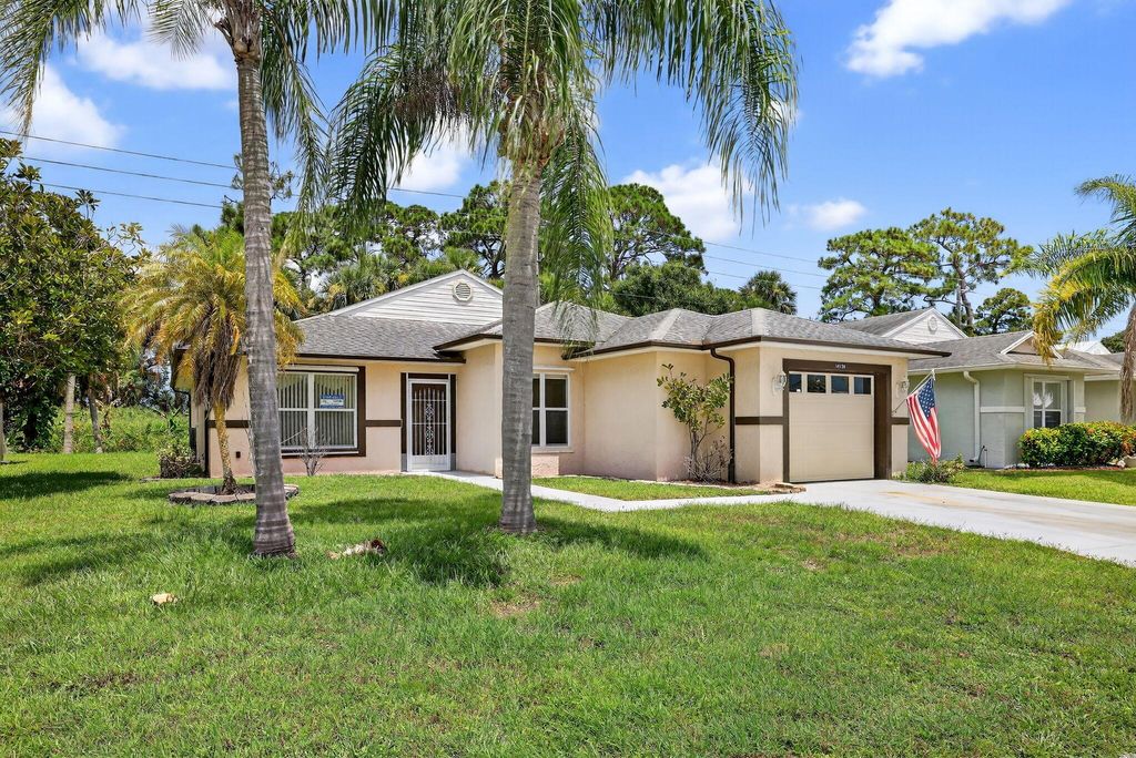 Photo of 14130 Aguila Ave, Fort Pierce, FL 34951 (MLS # R11111973)