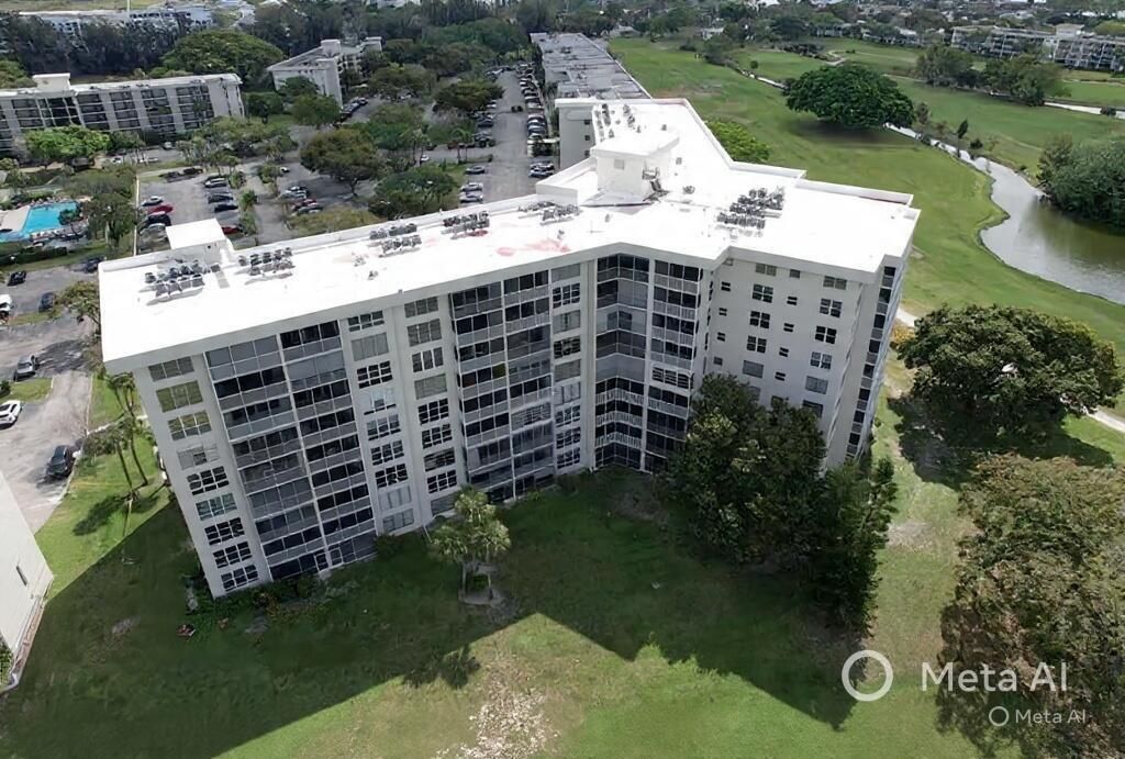 Photo of 2681 S Course Drive #511, Pompano Beach, FL 33069 (MLS # B26013229)