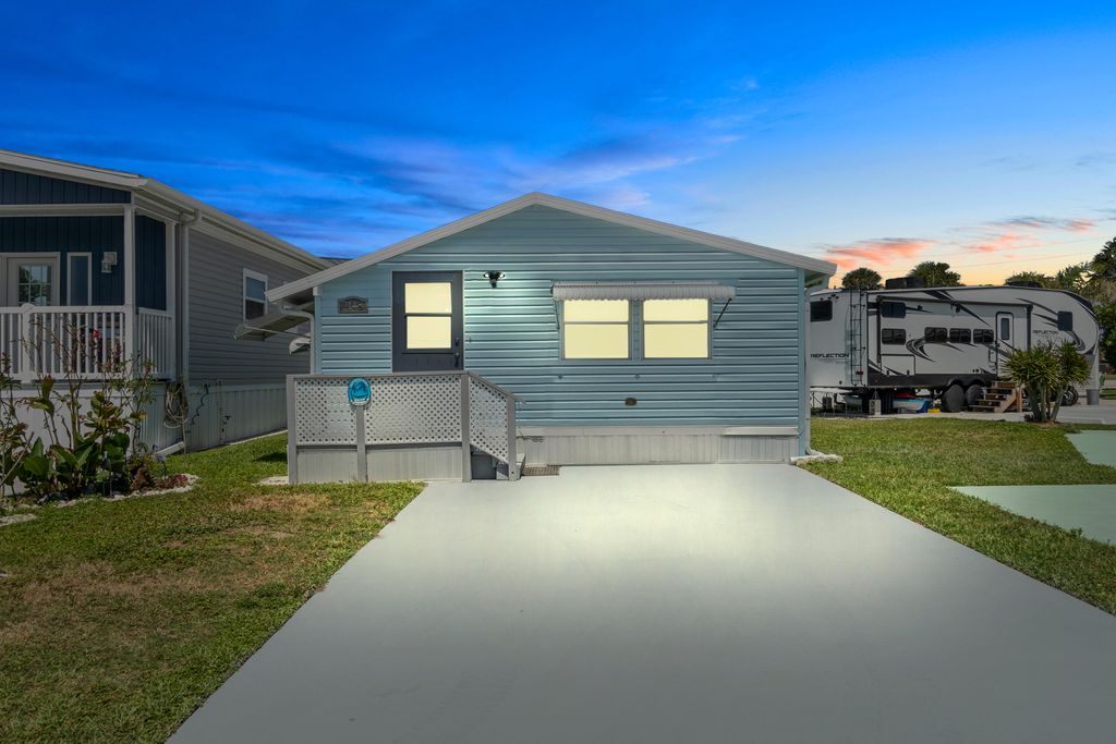 Photo of 2148 Nettles Boulevard, Jensen Beach, FL 34957 (MLS # R10794362)