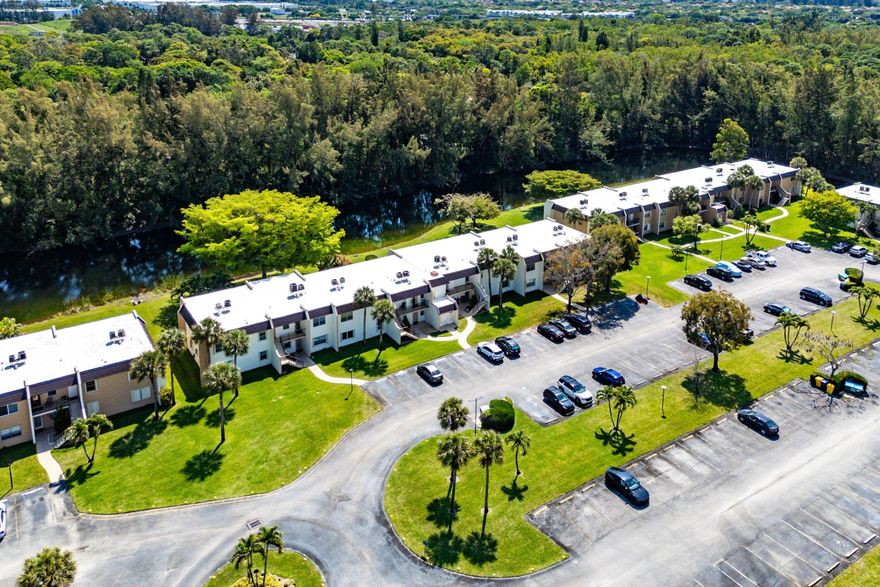 Beautifully renovated 2nd-floor corner unit in the highly desirable 55+ guard-gated community of Golden Lakes, offering privacy, tranquility, and stunning water views with no rear neighbors and no unit above. Featuring 1.5 bathrooms, tile flooring throughout, and accordion hurricane shutters for added peace of mind. The updated kitchen is appointed with granite countertops, newer stainless steel appliances, upgraded cabinetry, and a cozy eat-in area. The spacious primary bedroom includes a walk-in closet and an updated bathroom. Enjoy Florida living at its finest from the oversized screened-in balcony, perfect for relaxing and taking in the serene lake views. Additional highlights include an in-unit washer and dryer, ample storage space, new A/C and water heater, and a newer roof.   Furniture negotiable, making this an ideal opportunity for seasonal or full-time living.  Golden Lakes offers a vibrant, resort-style lifestyle with 24/7 security and an impressive array of amenities, including: Olympic-size pool and spa plus 5 satellite pools, Clubhouse with auditorium, café, fitness center, card and billiards rooms, Tennis courts, shuffleboard, and scenic lakes throughout the community. Courtesy bus transportation. A full calendar of activities led by a Lifestyle Director, including live entertainment, fitness classes, movies, and social events.  Conveniently located near Florida's Turnpike, shopping, dining, and top medical facilities, and just minutes from downtown West Palm Beach, beautiful beaches, and Palm Beach International Airport.  A perfect blend of location, lifestyle, and value—don't miss this opportunity to enjoy the best of South Florida living!