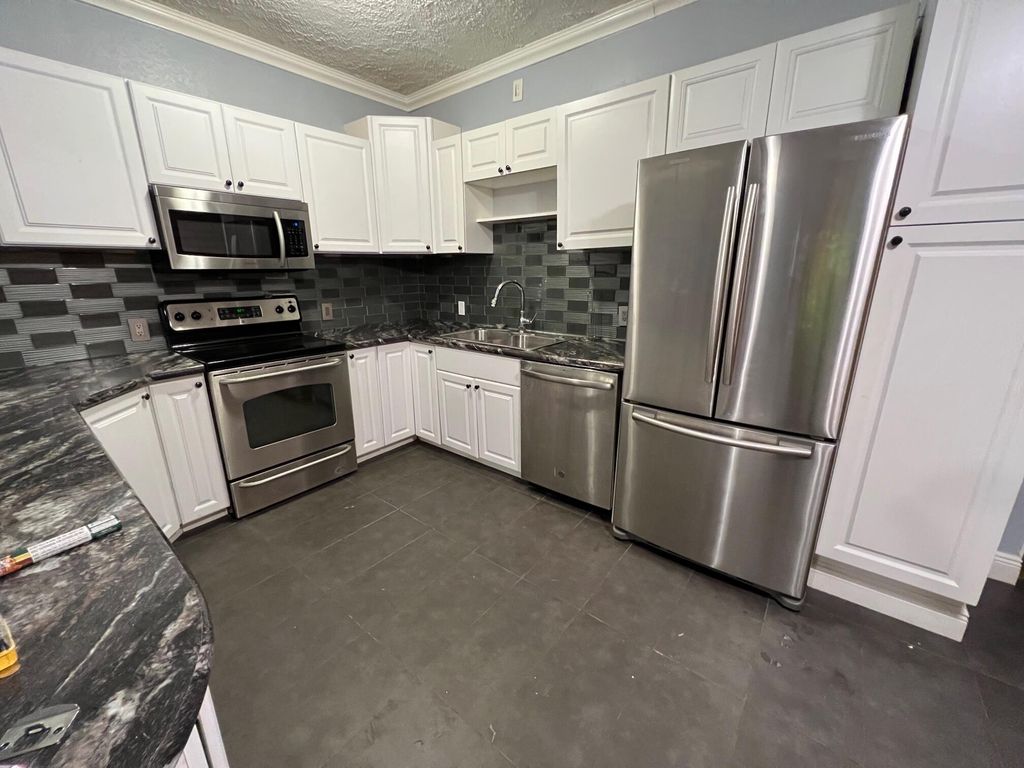 Photo of 1016 Chipola Road, Fort Pierce, FL 34950 (MLS # R10791886)