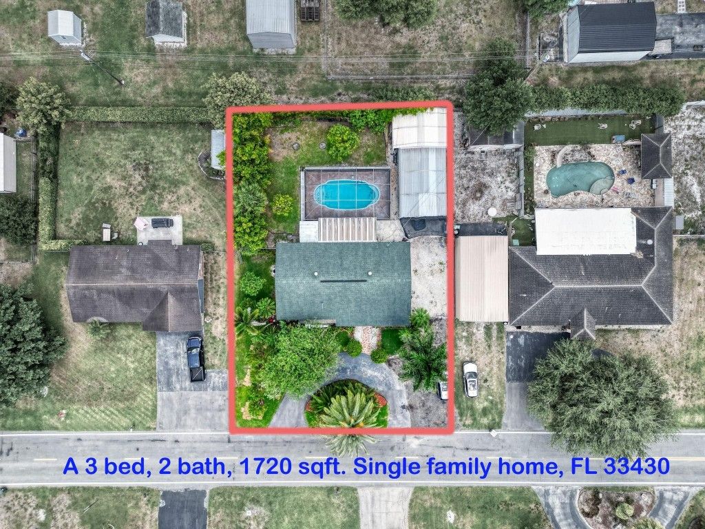 Photo of 209 NE 2nd Street, Belle Glade, FL 33430 (MLS # F10502791)