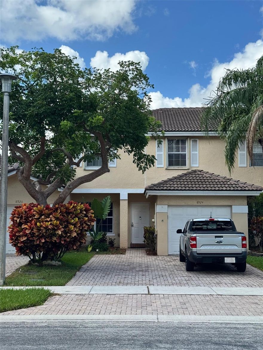 Beautiful 4 Bedroom 2 1/2 Bathroom townhouse with a one car Garage! Large master bedroom with walk in closet Granite countertops and Stunning lake view. This gated community includes a pool and playground. **HOA Dues cover exterior of property including Roof** Roof replaced in 2022. Second floor has accordion shudders and first floor has aluminum shutters. Fridge - 1 Year, Dishwasher 1 Year and AC 8 Years.  Perfect for a family or Investor looking for a long term rental. No association approval required for purchase or rental restrictions. This property is a must see and will not last long. As is sale.