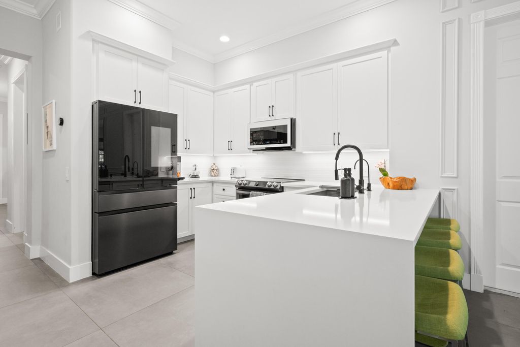 Photo of 310 San Remo Drive, Jupiter, FL 33458 (MLS # B26017647)