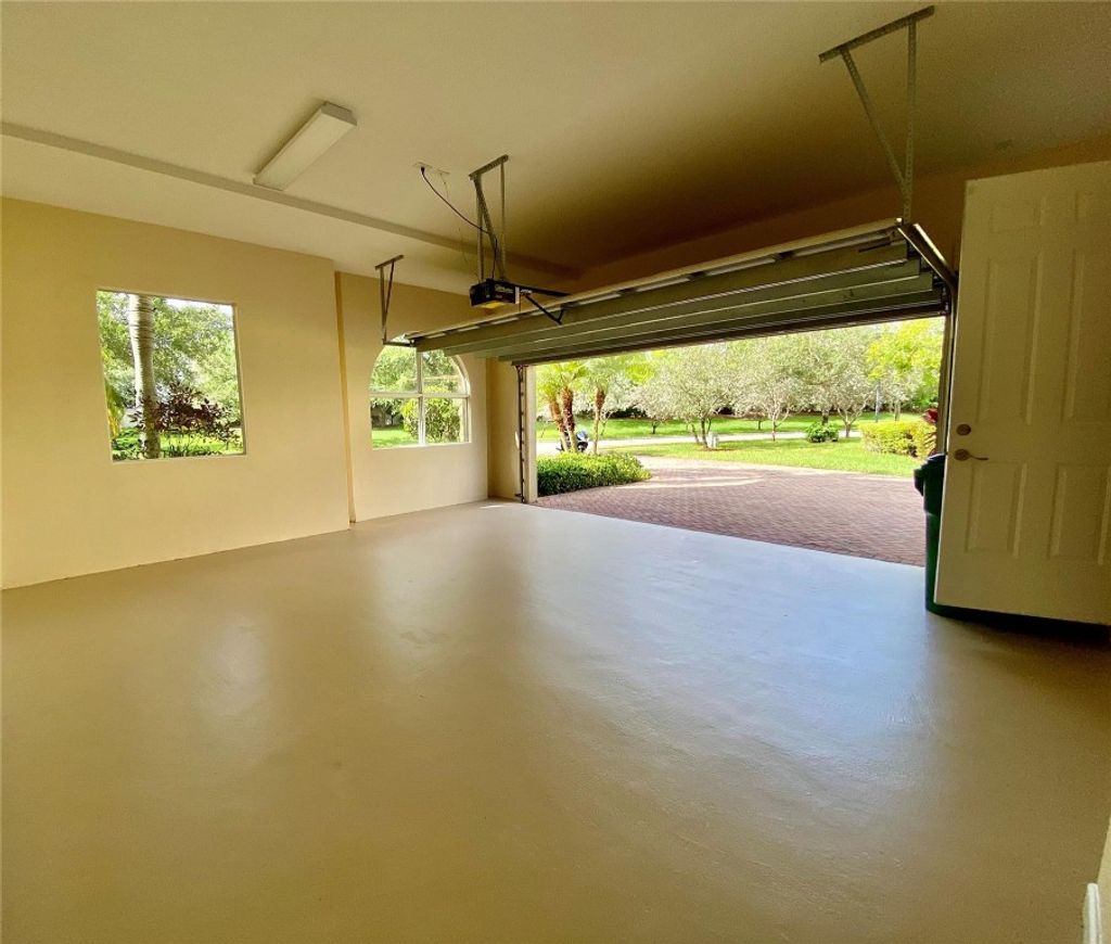 Photo of 5913 NW 117th Drive, Coral Springs, FL 33076 (MLS # F10459538)
