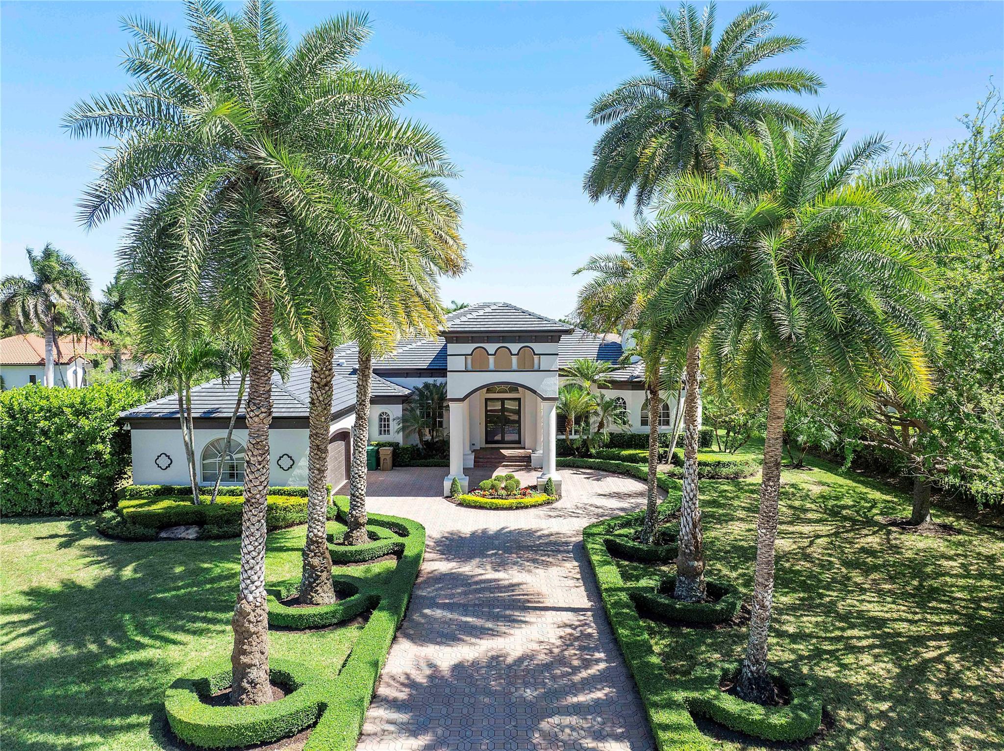 Rare opportunity in gated Blackhawk Reserve. Spectacular lakefront one story estate home on over 3/4 of an acre. Grand entry w/double portico. Brand new roof 2024. Elegant living/entertaining areas w/ volume & ceilings, marble flooring & contemporary appointments throughout. Chef's kitchen w/Wolf gas stove, Subzero fridge & stainless range hood. Triple split design w/ luxurious master retreat w/ 2 oversize closets & stunning new doors. Master bath completely remodeled last year! Four additional private bedrooms w/ensuite baths, plus office & spacious home theater! Additional features: plantation shutters, upgraded fans & fixtures throughout, new window treatments, 6 seat bar area, & new wood floors. 3 car garage w/ epoxy floors & 48amp Tesla charger. Community tennis courts.