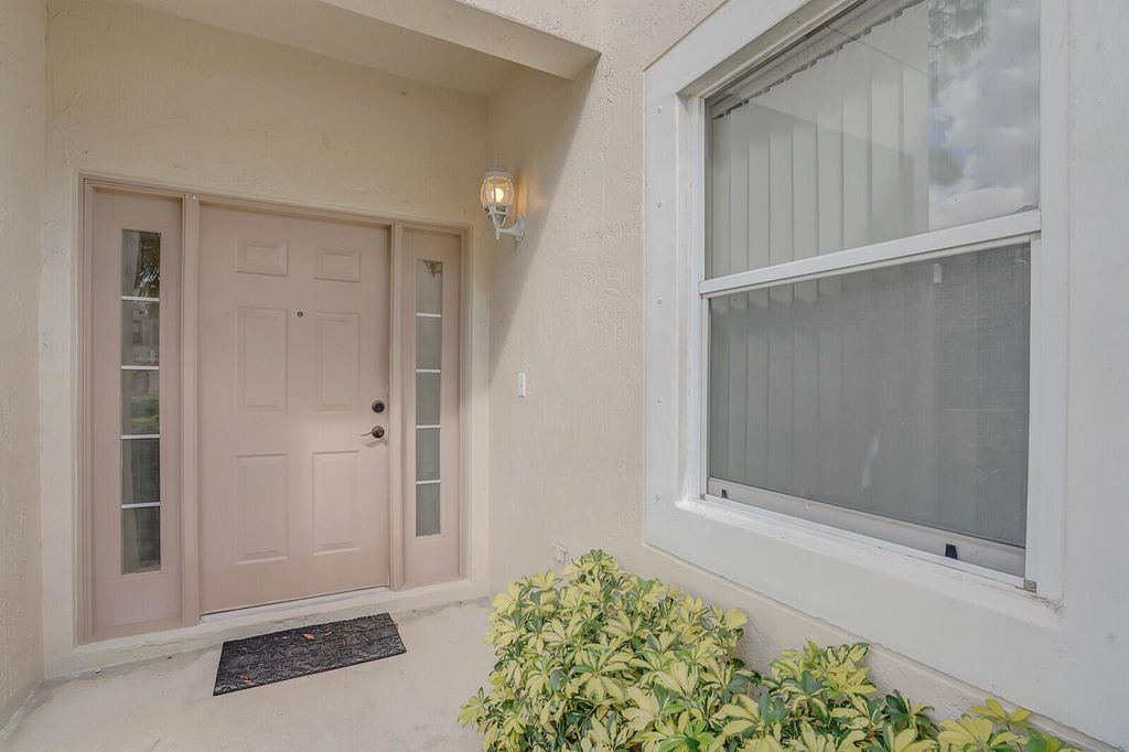 Photo of 801 Crosswinds Drive, Greenacres, FL 33413 (MLS # R11009218)