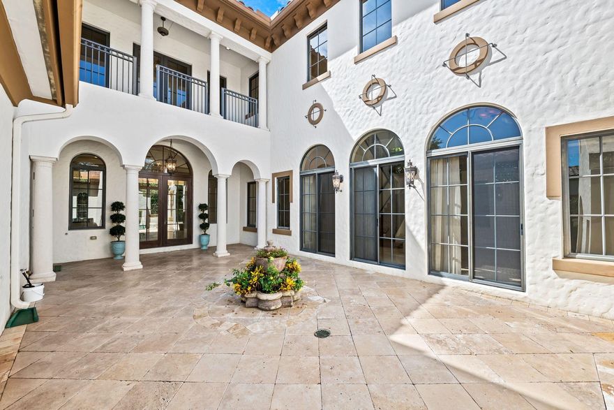 Well-appointed 2-story Prado model in the Gables Estates, with fantastic golf and water views. All impact windows & doors, and CBS construction includes 2nd floor. This Tuscan inspired home has 5 Bed, 4.5 baths and 3-car garage and is located on one of the most sought-after streets in Parkland Golf, with large lots and great views. Soaring ceilings, crown moldings, solid core doors, and many architectural details. 1st floor features a downstairs guest suite with sitting area. There is plenty of space to entertain in the formal living room, formal dining room, and family room. Plus, an oversized courtyard complete with fireplace. The spacious kitchen has abundant cabinets and counter space, double wall oven, and views of the 20 x 40 saltwater heated pool