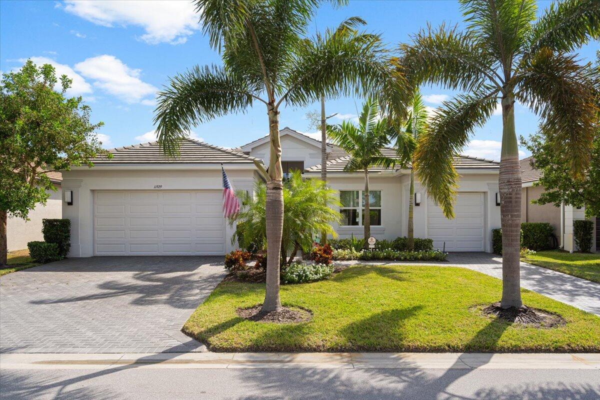 This Top Tier Crown Collection/Bellagio 3-bedroom 3-bathroom plus office, pool home, nestled on one of Valencia Cay's most private lakefront lots, stands as a beacon of luxury. The captivating lake view draws you to the serene backyard, complete with a saltwater heated pool and spa amidst lush landscaping. Yet, the interior's numerous enhancements are equally compelling. The gourmet kitchen with premium Level 5 cabinets, quartz countertops/backsplash with stainless appliances serves as the heartbeat of this spacious contemporary dwelling. Main Suite provides views to the backyard and has 2 large walk-in closets with custom cabinetry and a spa-like bathroom with large walk-in shower, plus his and her vanity areas. The 2nd Bedroom with ensuite awaits your guests.