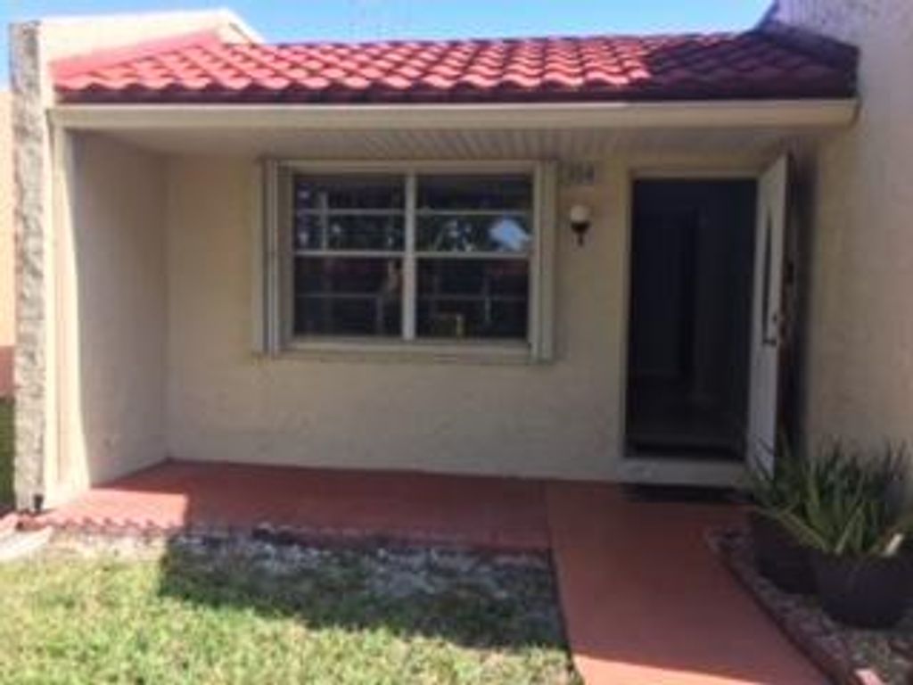 Photo of 114 Lake Irene Drive, West Palm Beach, FL 33411 (MLS # R10674711)
