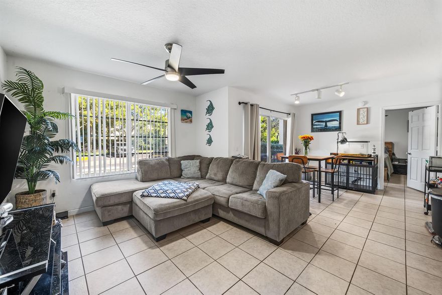 Step into this beautifully spacious one-bedroom, one-bathroom first-floor corner unit located in the desirable gated community of Emerald Isles in West Palm Beach. This bright and airy condo features tile flooring throughout, adding both style and easy maintenance. Enjoy your morning coffee or unwind in the evening on the private open balcony, perfect for relaxing or entertaining. The kitchen is equipped with a brand-new refrigerator (2025), along with a newer dishwasher and stove (2023), making it move-in ready and functional. The home also features a new A/C (2023), new water heater (2025), and a new washer (2024), ensuring peace of mind and added value. The spacious bedroom includes a generously sized walk-in closet, offering plenty of storage space. This well-maintained unit is locate