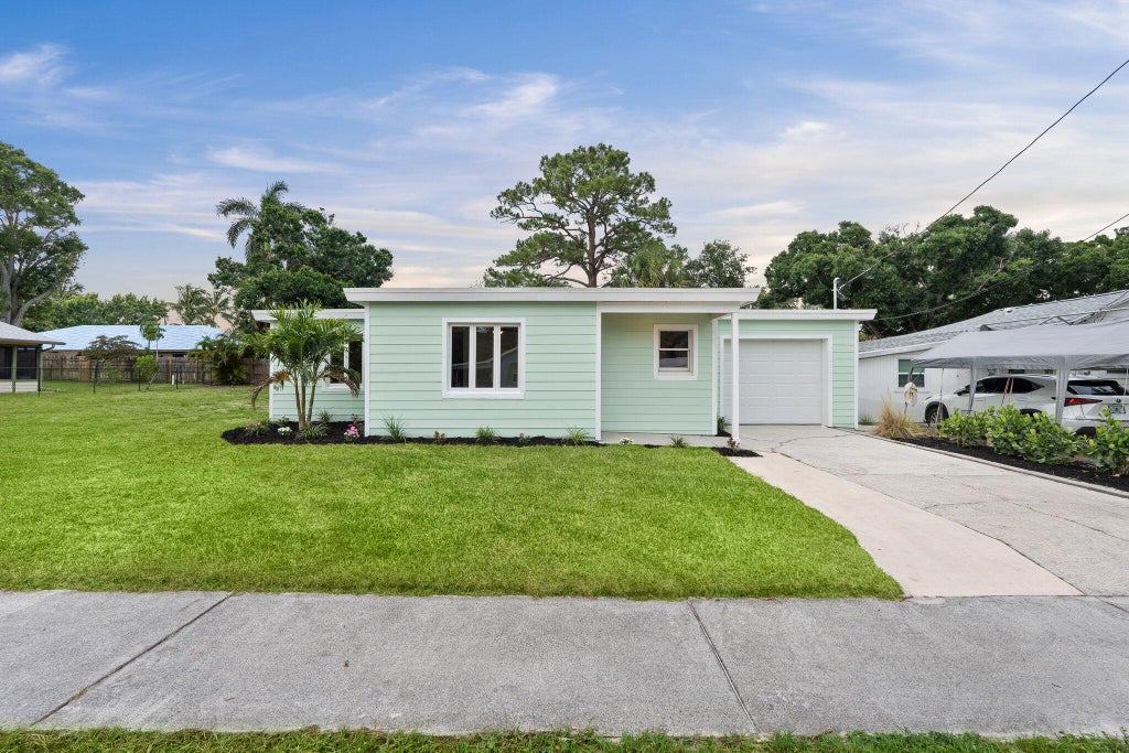 Photo of 677 NE Alice Street, Jensen Beach, FL 34957 (MLS # R11097634)