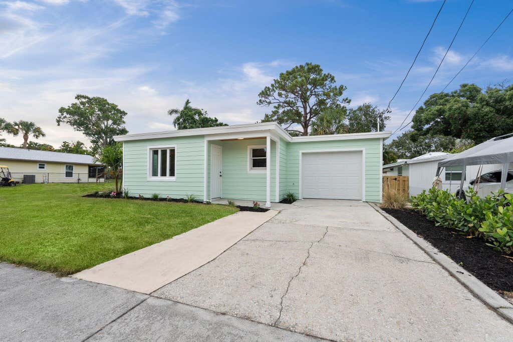 Photo of 677 NE Alice Street, Jensen Beach, FL 34957 (MLS # R11097634)