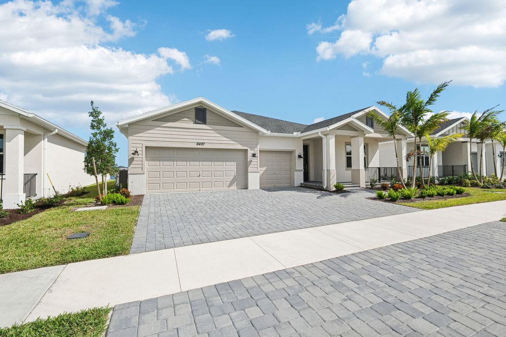Photo of 6497 NW Cloverdale Avenue, Port Saint Lucie, FL 34987 (MLS # R11030932)