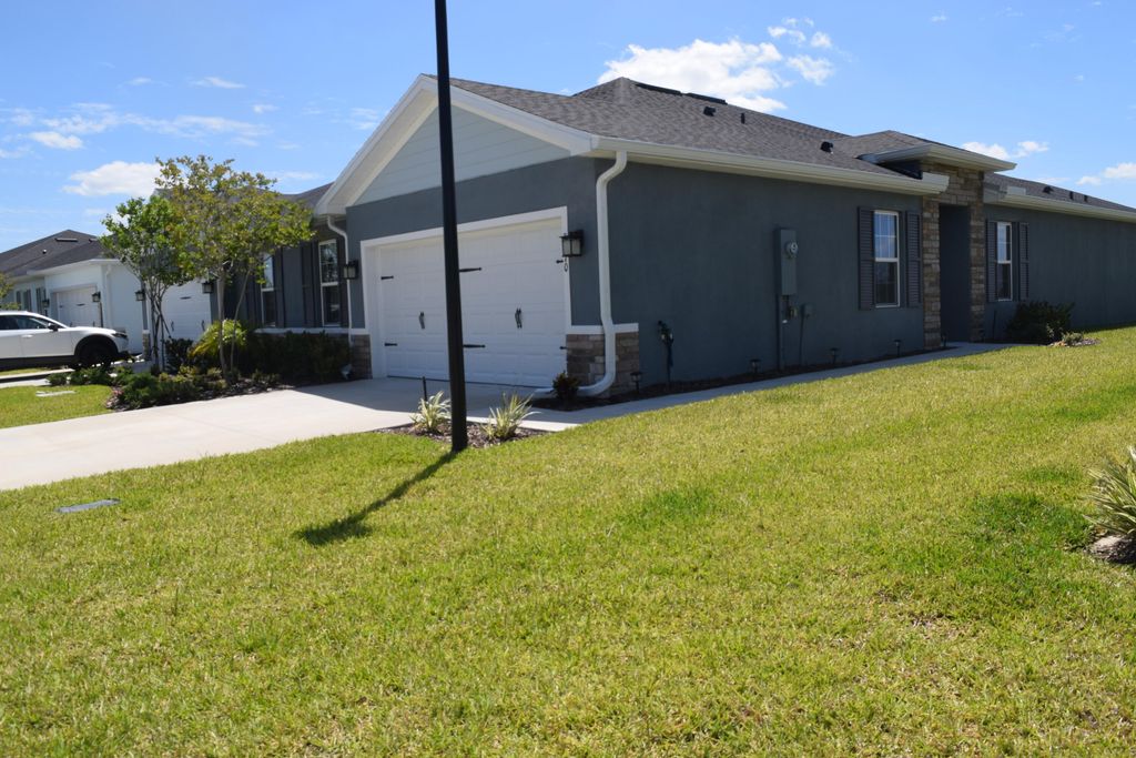 Photo of 9670 SW Libertas Way, Port Saint Lucie, FL 34987 (MLS # B26024075)