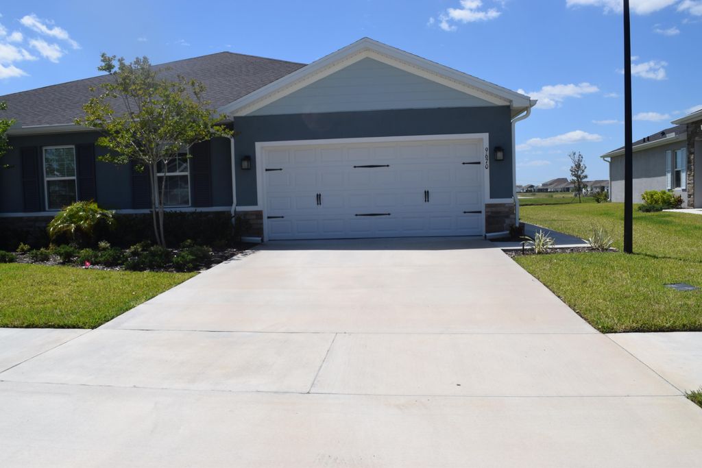 Photo of 9670 SW Libertas Way, Port Saint Lucie, FL 34987 (MLS # B26024075)
