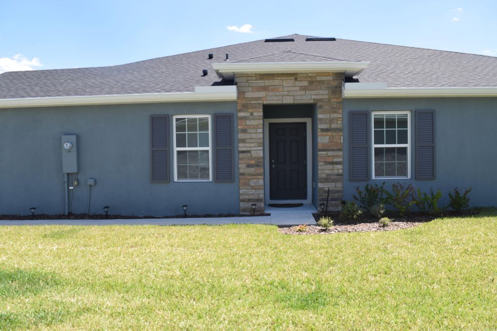 Photo of 9670 SW Libertas Way, Port Saint Lucie, FL 34987 (MLS # B26024075)