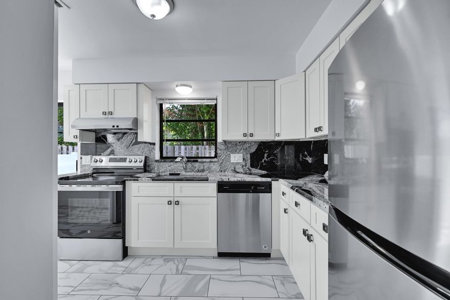 Beautifully updated 2 bedroom 2 bathroom apartment in East Boca Raton, FL. Unit features tile floors throughout, updated kitchen with stainless steal appliances, washer and dryer in unit, brand new central AC unit, oversized master suite, screened in patio, and private fenced in yard surrounded by tropical landscape. Conveniently close to beaches, great restaurants, and shopping. Boca Schools!