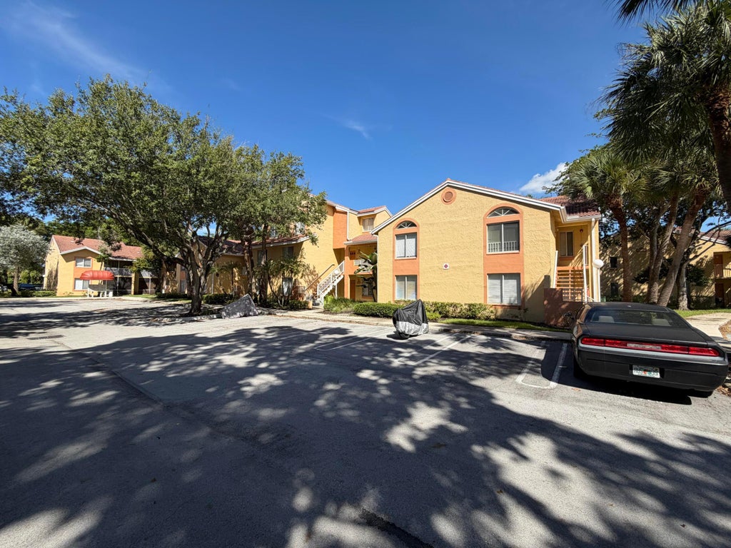 Photo of 938 CORAL CLUB Drive #938, Coral Springs, FL 33071 (MLS # B26081874)
