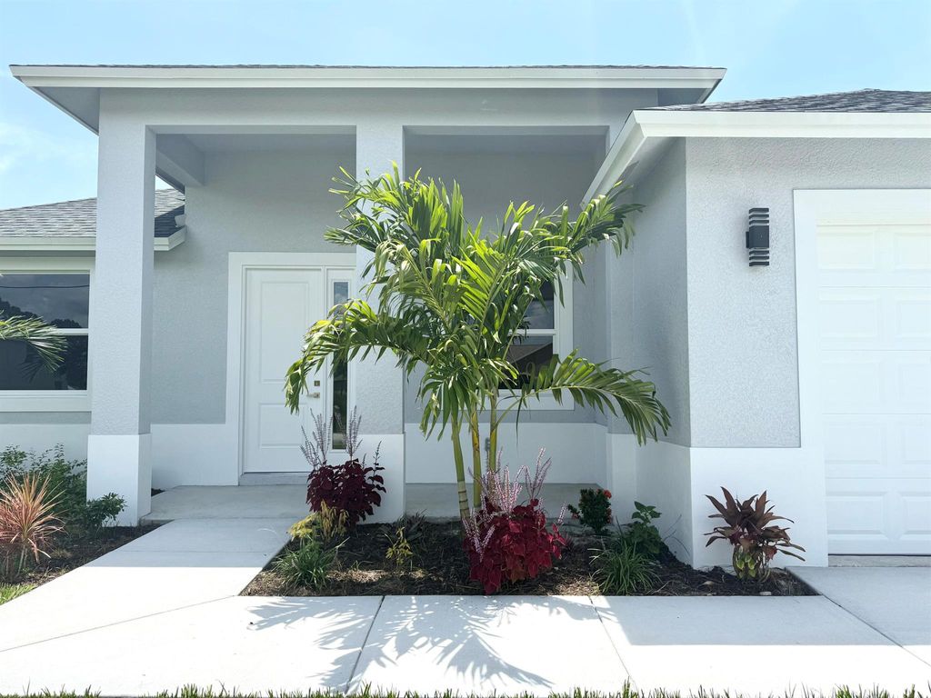 Photo of 5941 NW Center Street, Port Saint Lucie, FL 34986 (MLS # R11105725)