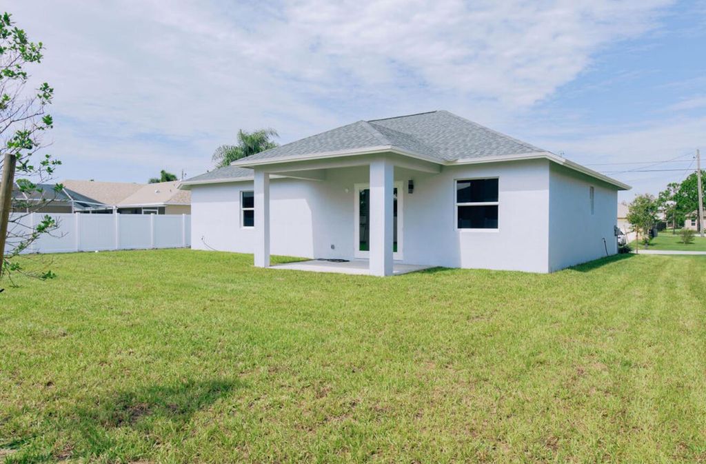Photo of 5941 NW Center Street, Port Saint Lucie, FL 34986 (MLS # R11105725)