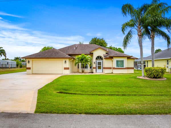 Photo of 5777 NW Eskimo Circle, Port Saint Lucie, FL 34986 (MLS # R11087295)