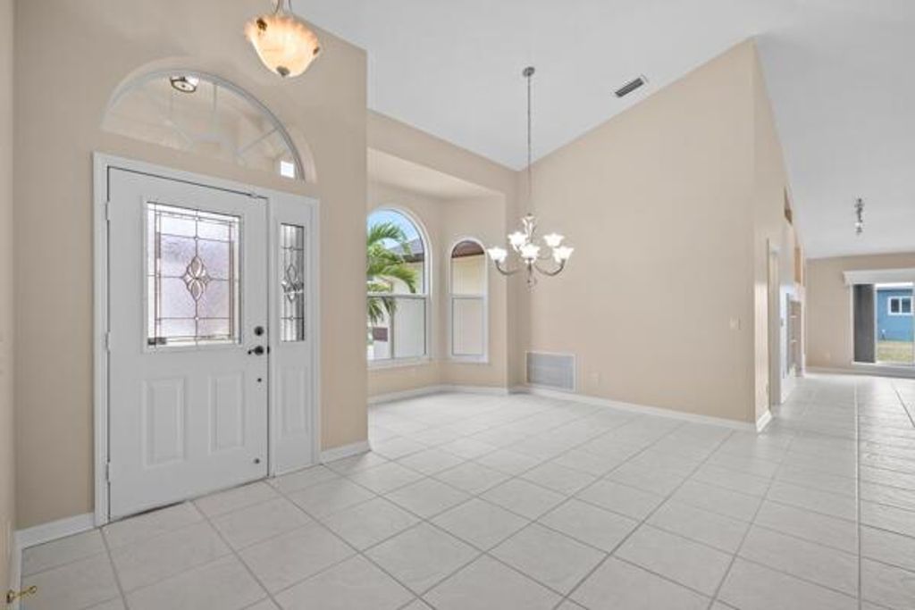 Photo of 5777 NW Eskimo Circle, Port Saint Lucie, FL 34986 (MLS # R11087295)