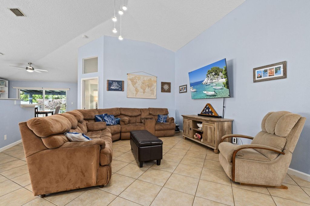 Photo of 864 NW Waterlily Place, Jensen Beach, FL 34957 (MLS # B26030046)