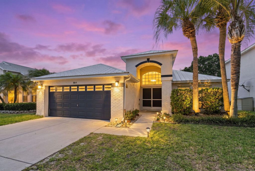 Photo of 864 NW Waterlily Place, Jensen Beach, FL 34957 (MLS # B26030046)