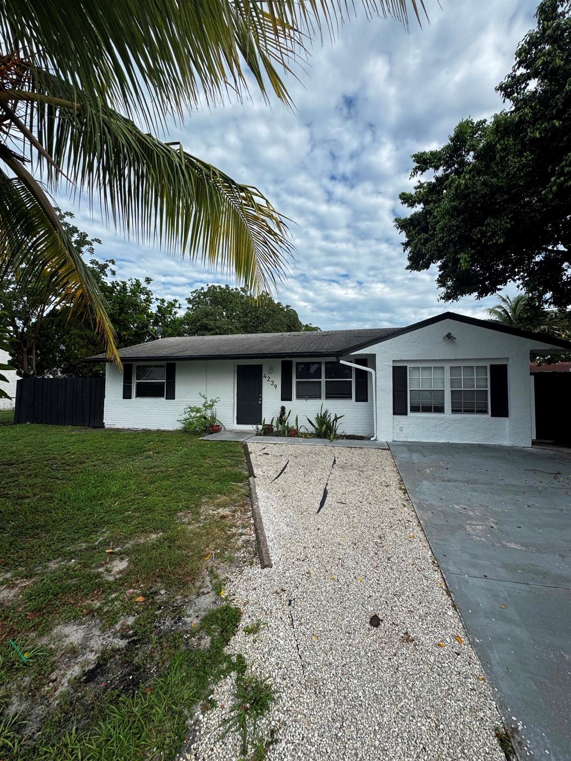 Newly renovated 4 bedroom 2 full bathroom single family home located on a quiet street with and fenced in backyard. This property is centrally located to I-95 and the Florida Turnpike with all your shopping needs right around the corner.