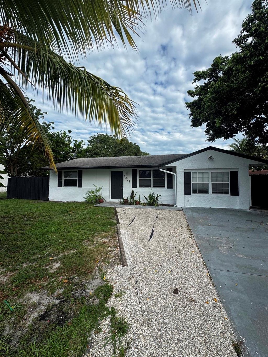 Photo of 4239 Empire Way, Greenacres, FL 33463 (MLS # F10516669)