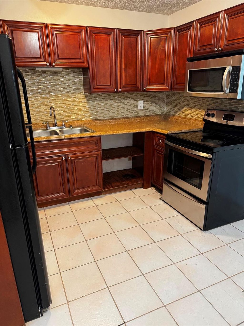 Photo of 4239 Empire Way, Greenacres, FL 33463 (MLS # F10516669)