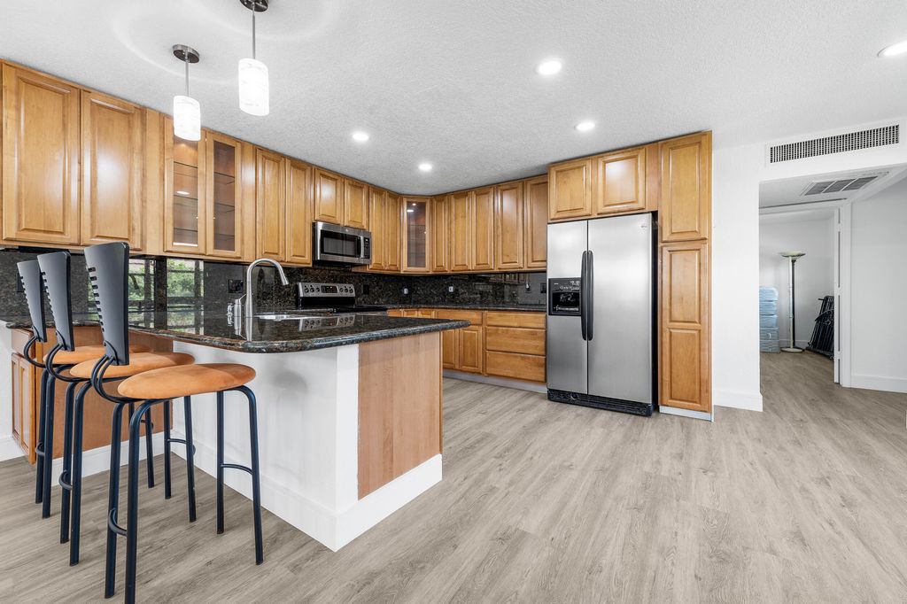 Photo of 154 Seville G, Delray Beach, FL 33446 (MLS # B26023670)