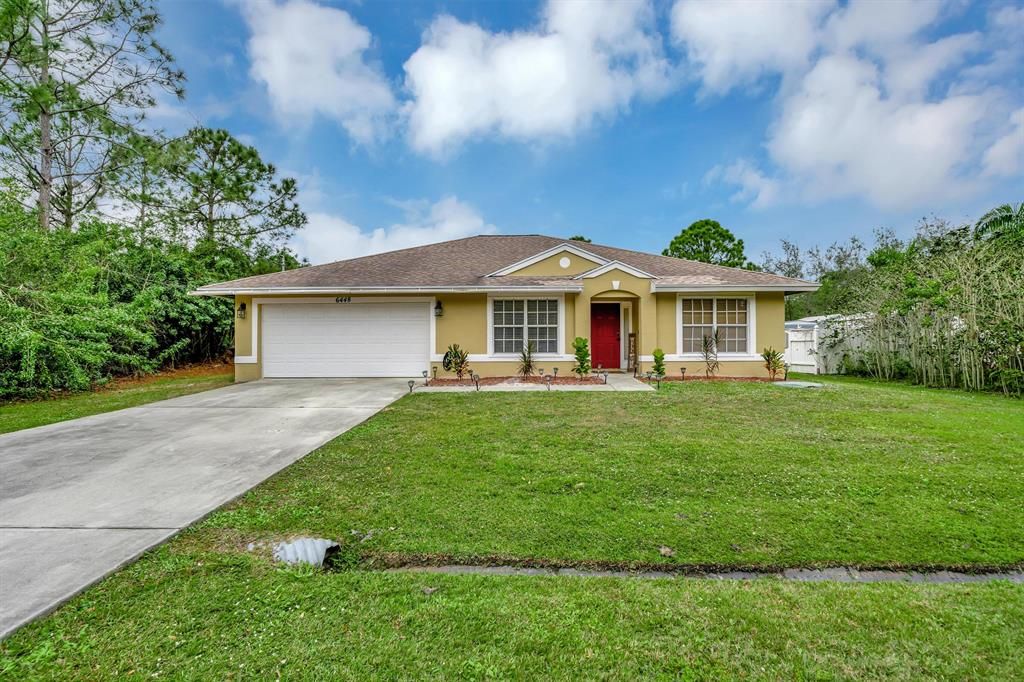 Photo of 6448 NW Foxglove Street, Port St Lucie, FL 34986 (MLS # R10864753)