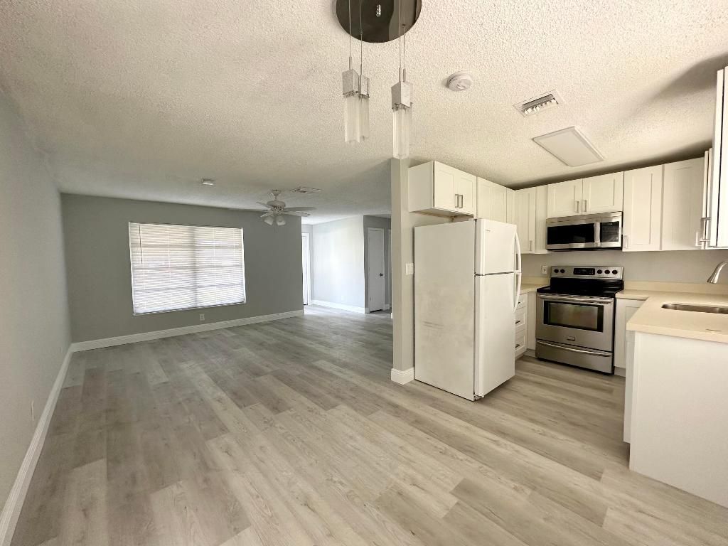 Photo of 4371 NW 1st Terrace, Deerfield Beach, FL 33064 (MLS # R11127769)