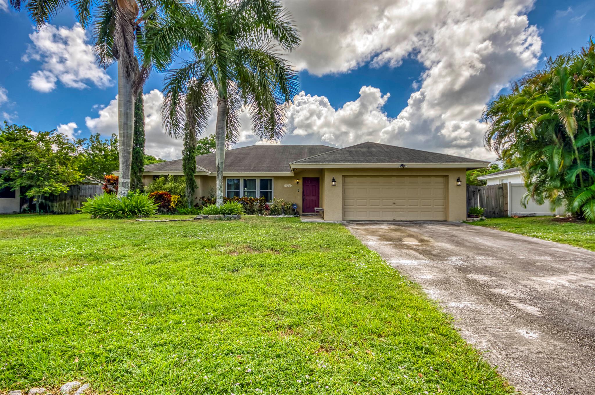 Welcome Home! Don't miss your chance to own this inviting and well-maintained 3-bedroom, 2-bathroom residence in the heart of Royal Palm Beach. Nestled in the highly desirable no-HOA community of The Willows, this home is truly a hidden gem. Step inside to discover a spacious split-bedroom floor plan designed for both comfort and privacy. The interior offers two versatile seating areas and a dedicated dining room, making it ideal for everyday living as well as entertaining family and friends. The bedrooms provide plenty of comfort, while the bathrooms are thoughtfully designed with functionality in mind. Outside, enjoy a private backyard, perfect for relaxing or hosting gatherings. The location couldn't be better! Just minutes from top-rated schools, shopping centers, grocery stores,