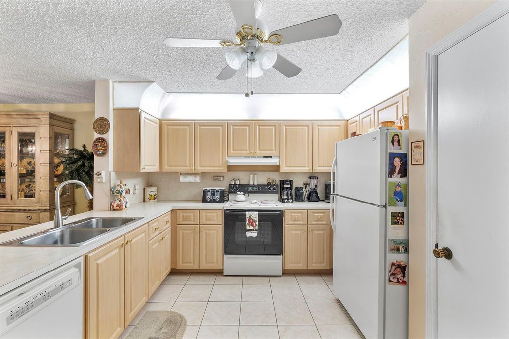 Photo of 3013 NW 103rd Ln, Coral Springs, FL 33065 (MLS # F10531588)