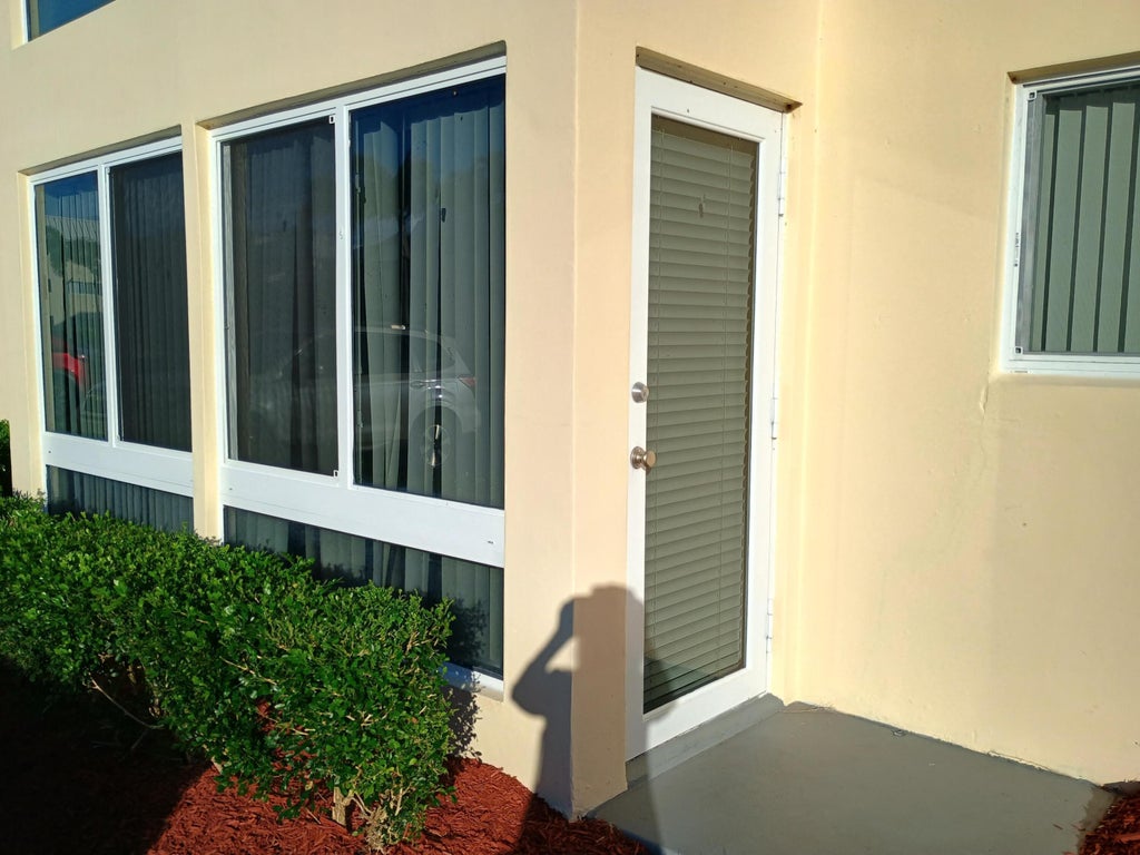 Photo of 3 Colonial Club Drive #100, Boynton Beach, FL 33435 (MLS # R11129563)
