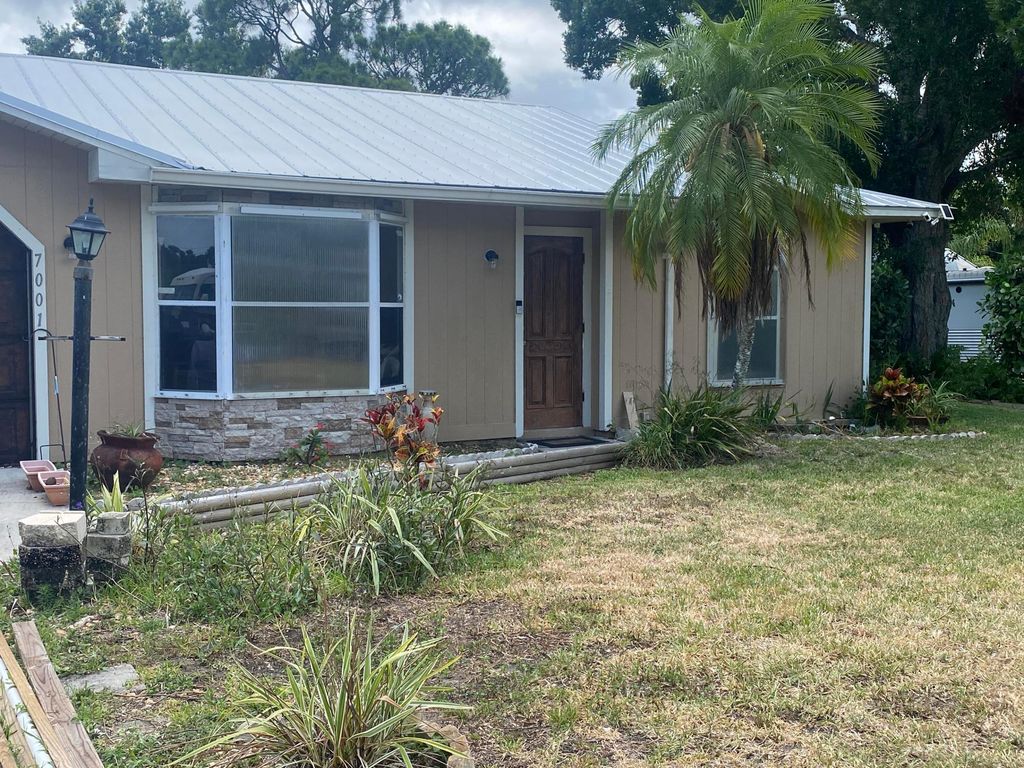 Photo of 7001 Lakeland Boulevard, Fort Pierce, FL 34951 (MLS # R11090008)
