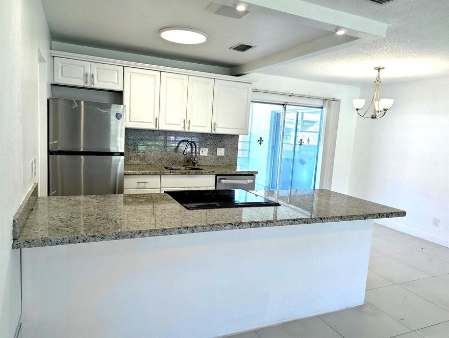 It's new! New bathroom, new appliances, new A/C, and fresh paint! Open kitchen with granite counter tops, tile floors throughout, plus a screened porch and a one car garage! Leisureville is a 55+ Community that features a 9 hole executive golf course, 2 clubhouses with pools and a courtesy bus. Leisureville requires one occupant to be 55 or older and also requires a minimum 700 credit score.